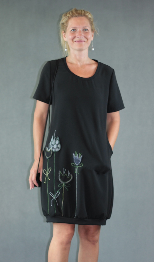 0450_P_detail_polyester_viskóza_bez_podšívky_černá_zelená__1kapsa_úplet__zeleno černá_tulipán_louka